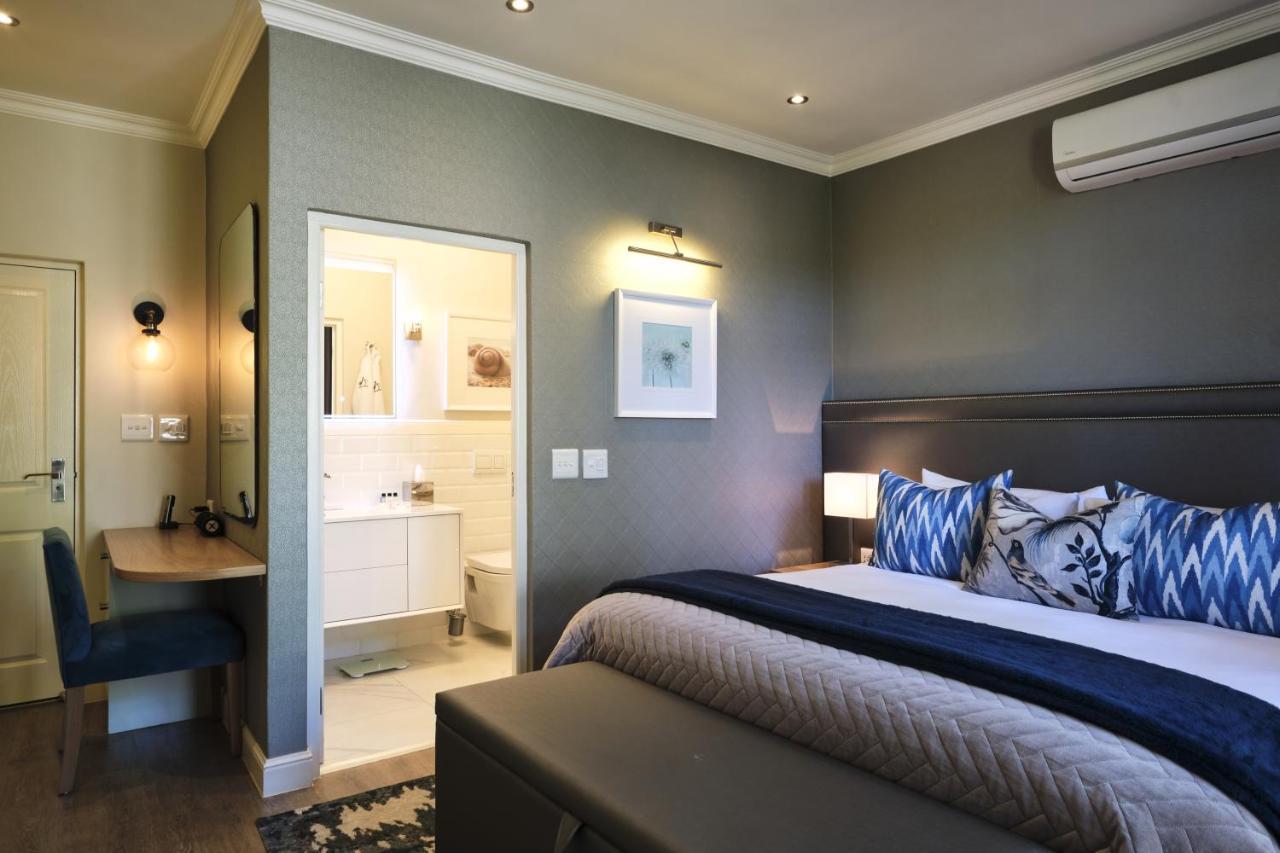 Alluvia Boutique Winery & Luxury Accommodation Stellenbosch Eksteriør billede A bedroom at the Oyster Box