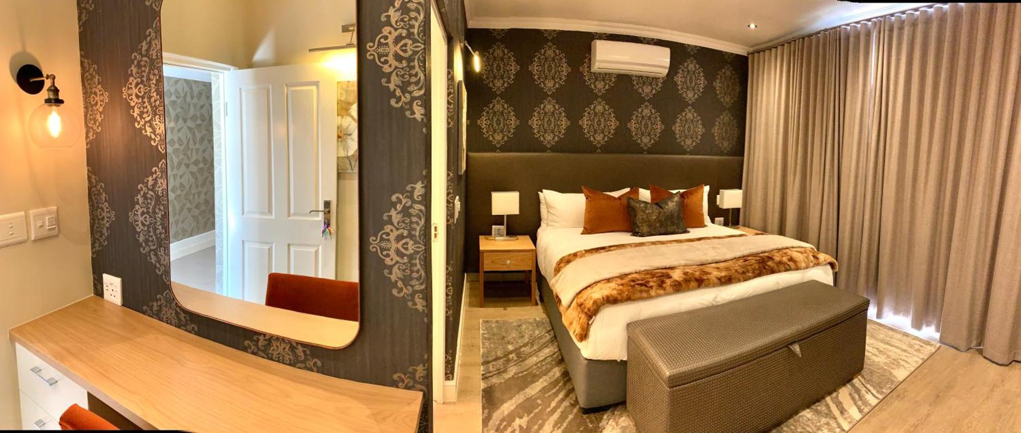 Alluvia Boutique Winery & Luxury Accommodation Stellenbosch Værelse billede A bedroom at the Cape Heritage